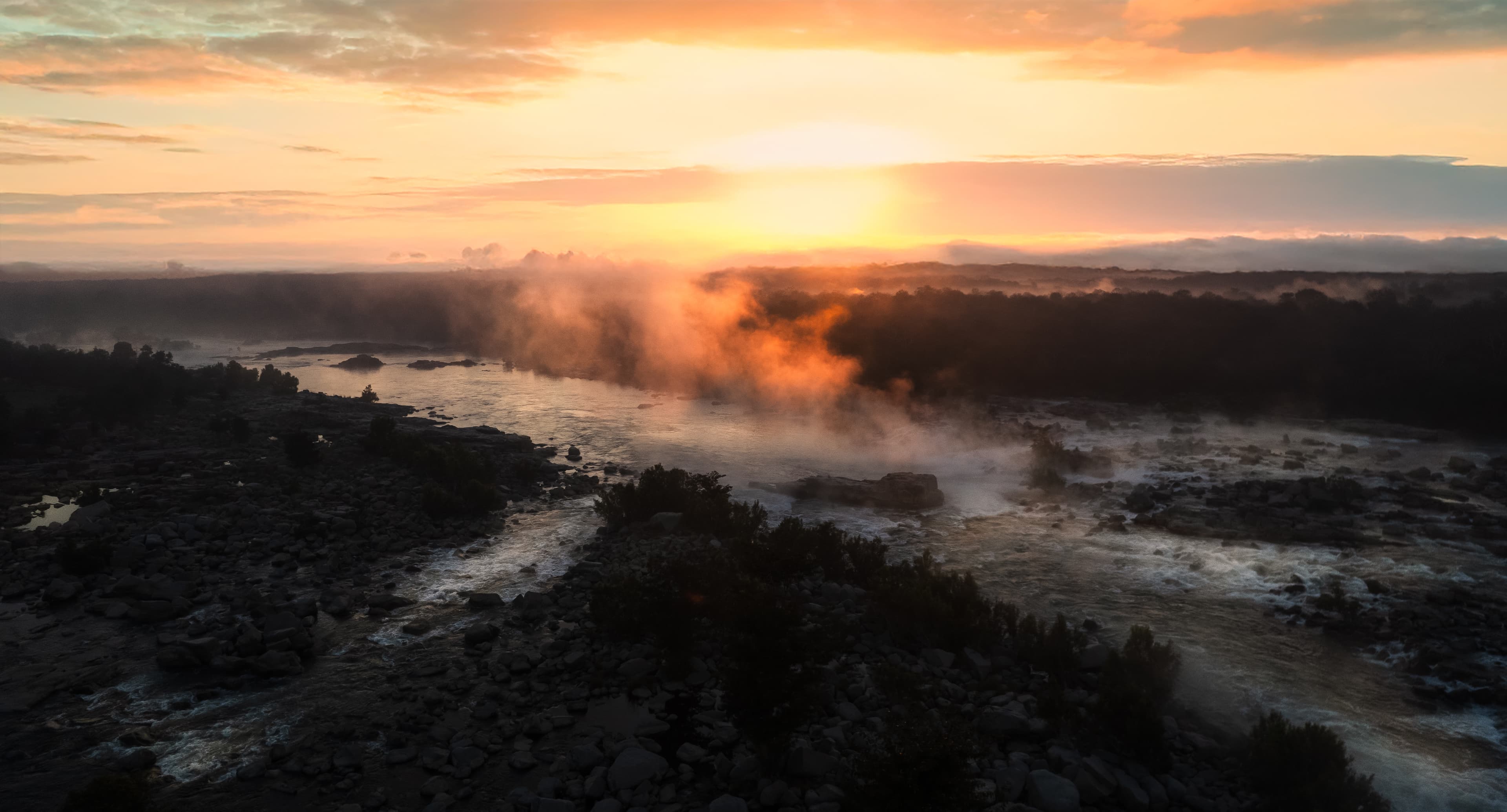The River Wakes in Fire and Fog