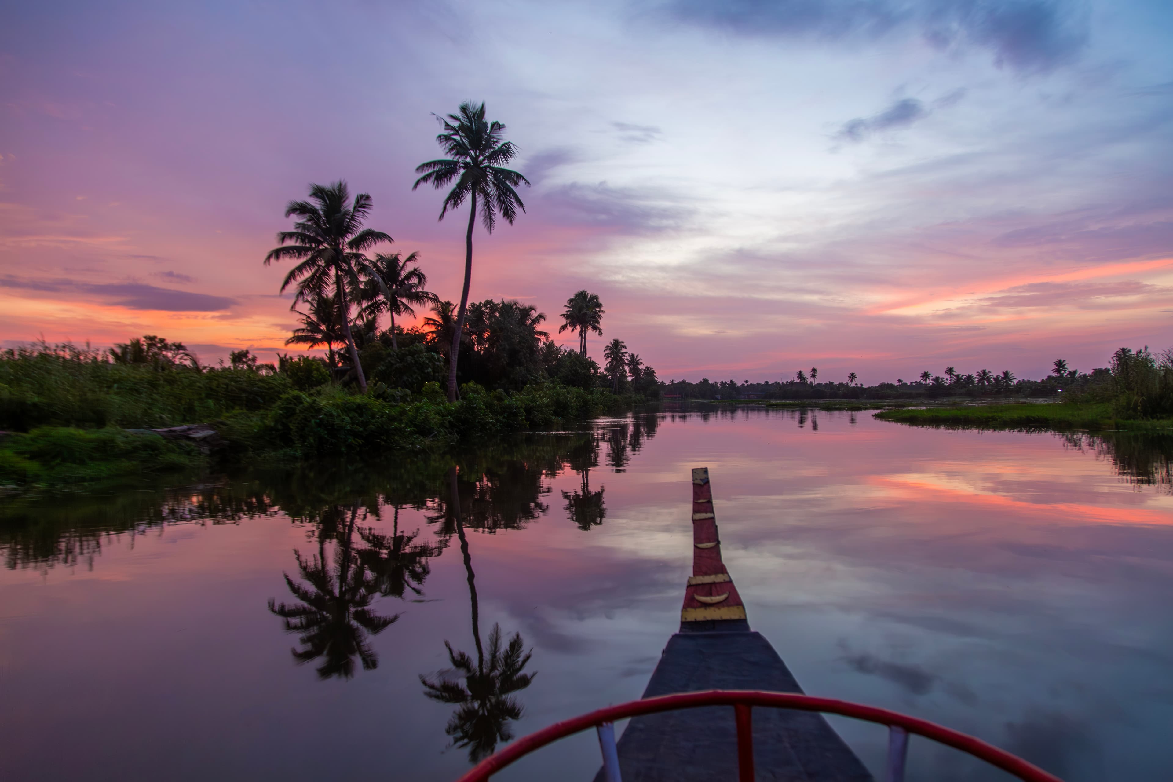 Twilight Reflections on a Kumarakom Backwater Cruise
