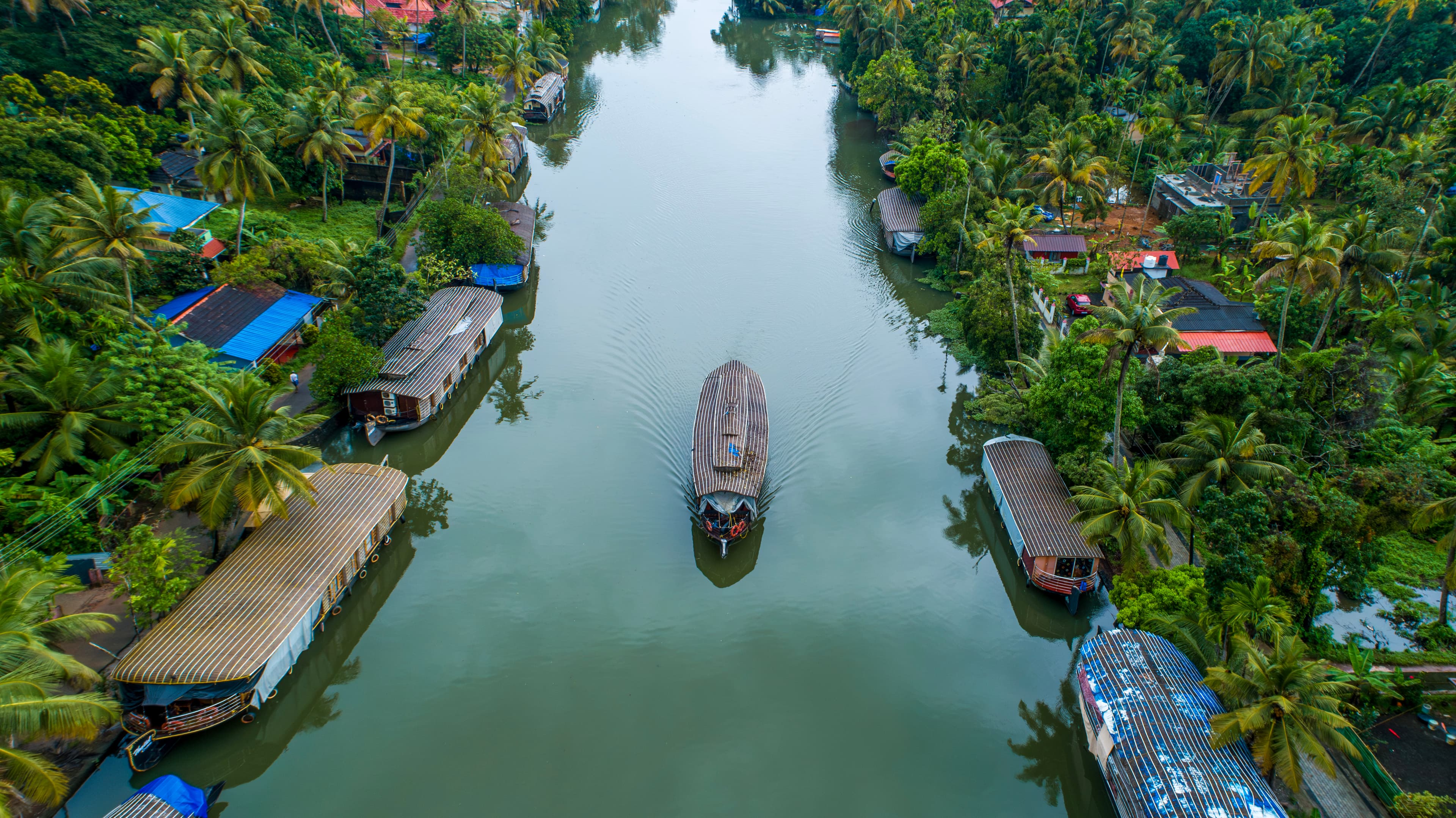 Houseboat Journey Through Kumarakom's Serene Backwaters